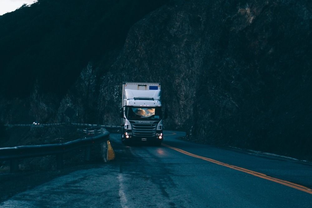 Lorry driver alone on a road